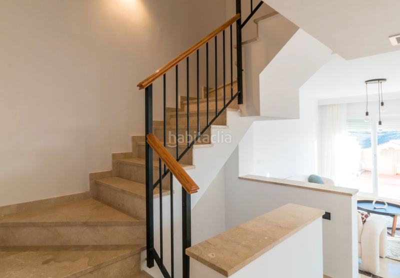 Foto 33375758-159e-4c5b-a811-69be5bdf5235. Casa adossada amb xemeneia piscina a La Duquesa Manilva