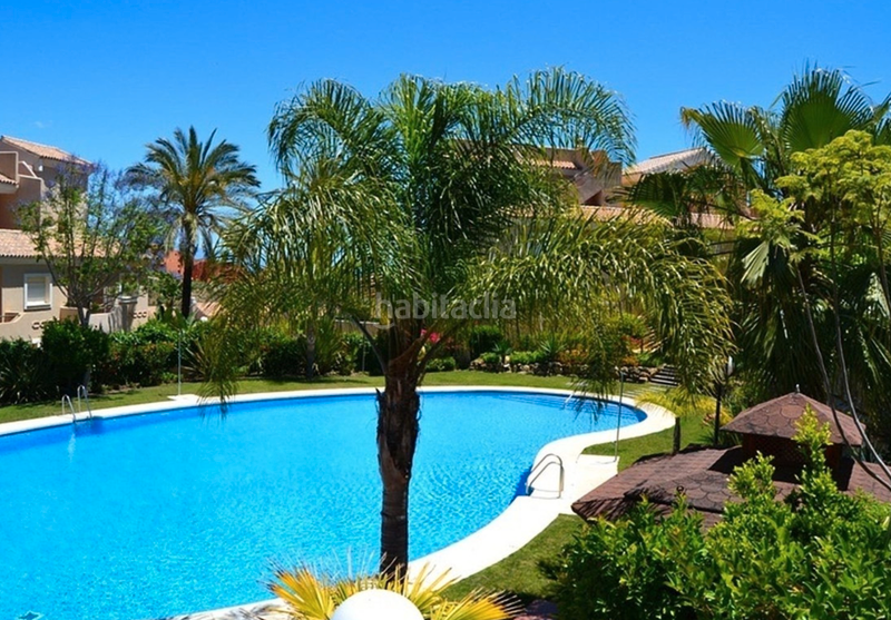 Foto 5a076b22-5c6b-435d-bd77-39e3ad866396. Casa adossada amb xemeneia piscina a La Duquesa Manilva