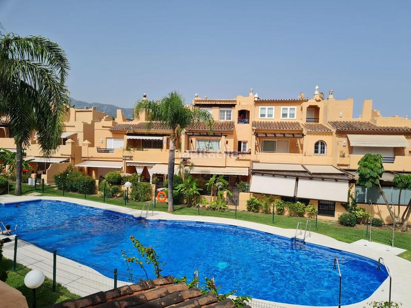 Foto 3b7e1448-60d4-4ebc-b6fd-7d0b4ba04ea8. Casa adosada vive el sueño mediterráneo en nagüeles: amplia casa adosada con piscina y vistas en Marbella