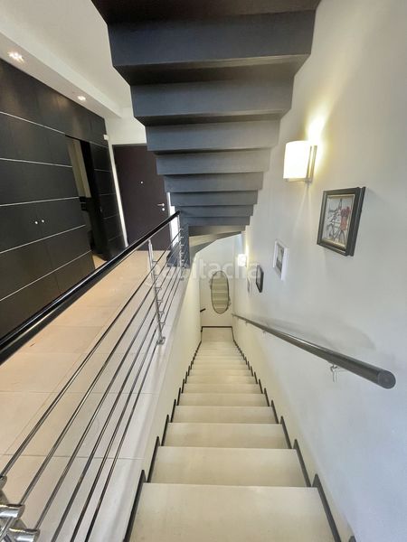 Foto b1de437f-8454-4782-826a-1c579492b419. Casa adossada amb piscina a Sierra Blanca Marbella