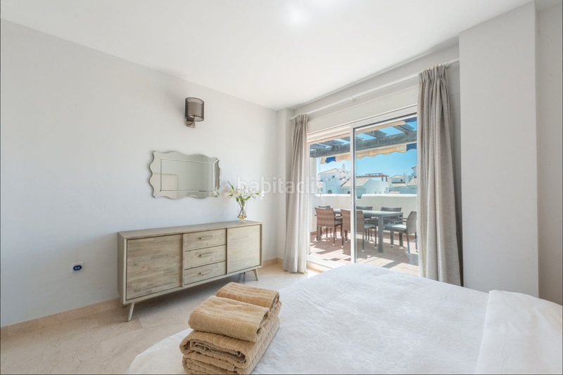 Foto e109d96b-3056-47e3-8b9e-2110ca6c18f7. Zweistöckige wohnung mit parking pool in Nueva Alcántara Marbella