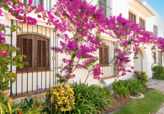 Maison jumelée à Urbanización costalita pueblo andaluz 131. Moderna adosada en primera linea de playa, villacana, estepona