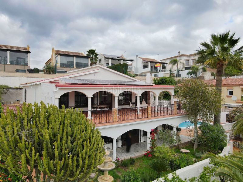 Foto 21c0505d-3e7a-4b04-acf7-c6529415c60e. Chalet en terreno sup.r.8 268 su refugio de paz y lujo en la costa del sol: una oportunidad única para familias en Coín