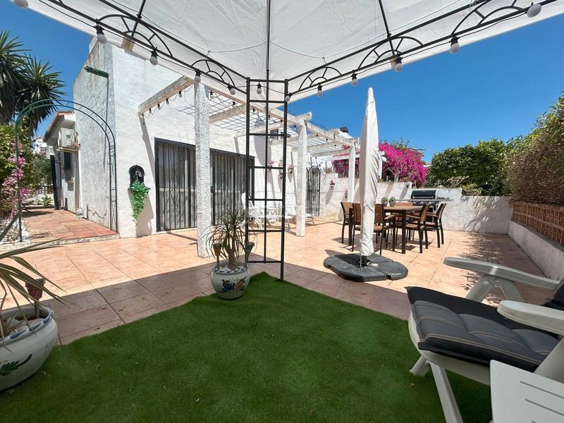 Foto 5d726e3f-9f73-4d3a-b07a-efc93da29c66. Casa adosada en n-340 147 la duquesa: tu rincón con encanto en Manilva