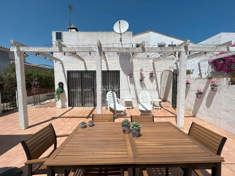 Foto fd167cae-8afe-4d6a-a5e6-d608c8de052e. Casa adosada en n-340 147 la duquesa: tu rincón con encanto en Manilva