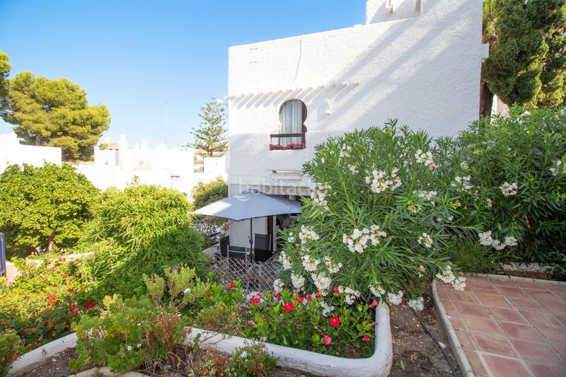 Foto 766ff633-3a7d-4e86-8da5-b0dcc8d4b39e. Casa pareada en urbanización la alzambra 11 tu vida soñada en Marbella