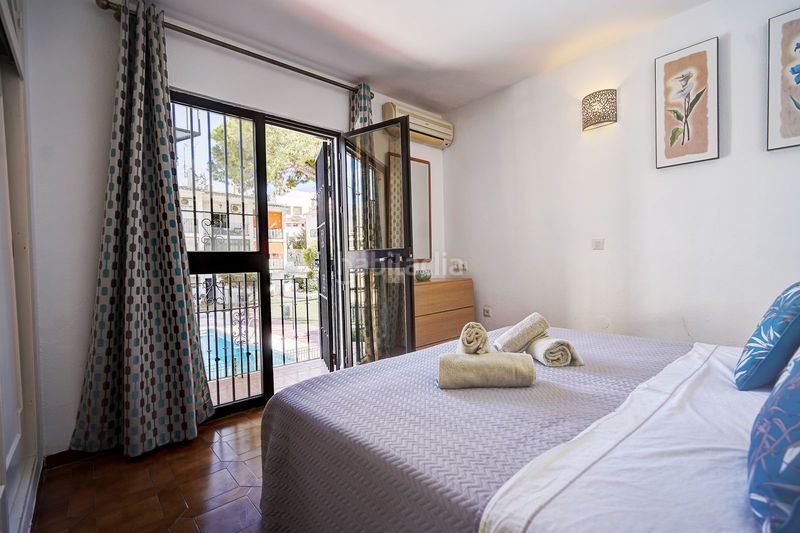 Foto c28ea32d-30f2-4621-956d-ce2e1a60ba4b. Casa adossada amb piscina a Bello Horizonte - Lindasol Marbella