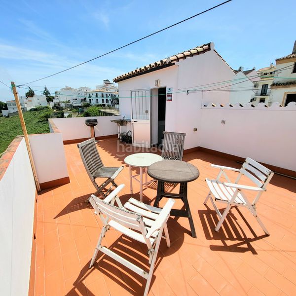 Foto dfe0f685-1867-42b2-b3d1-8264f1f5c784. Casa aparellada amb aparcament a Manilva pueblo Manilva