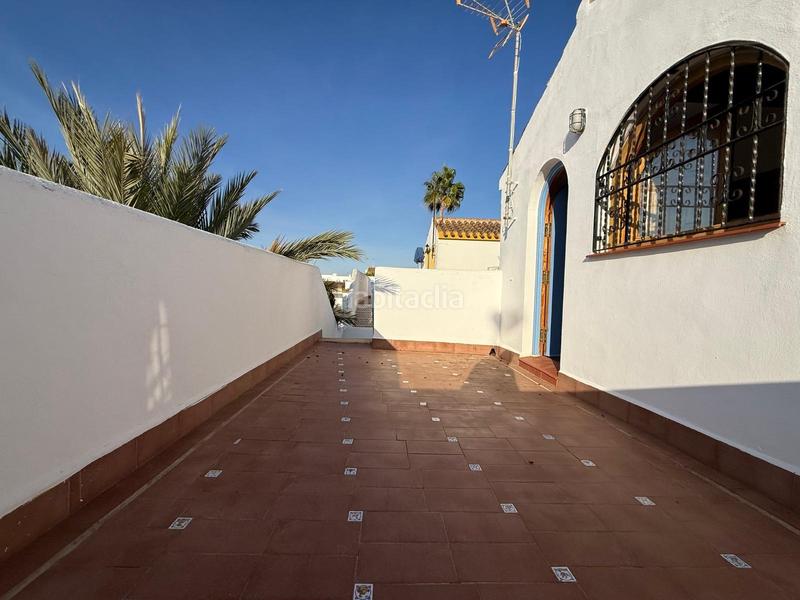 Foto 28d1f820-d8f4-4f58-a2b8-4ad66c5b5264. Casa aparellada amb aparcament piscina a Pueblo Latino Pilar de la Horadada