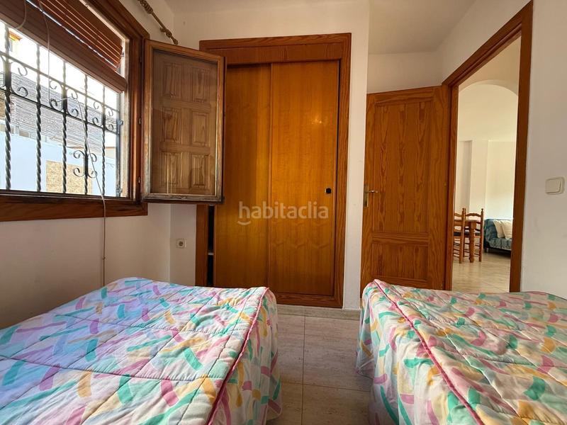 Foto 4caf6b3b-4c20-442e-892b-7f3943ad96a5. Towny house with parking pool in Pueblo Latino Pilar de la Horadada