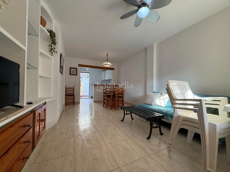 Foto 91f2fc25-6bf9-4e7c-a979-47abd73b1a50. Towny house with parking pool in Pueblo Latino Pilar de la Horadada