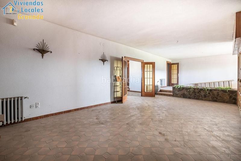Foto 0ea9f592-4369-48d5-a7a8-b2aa801c3e0a. Masía casa con terreno y nave en Santa Fe