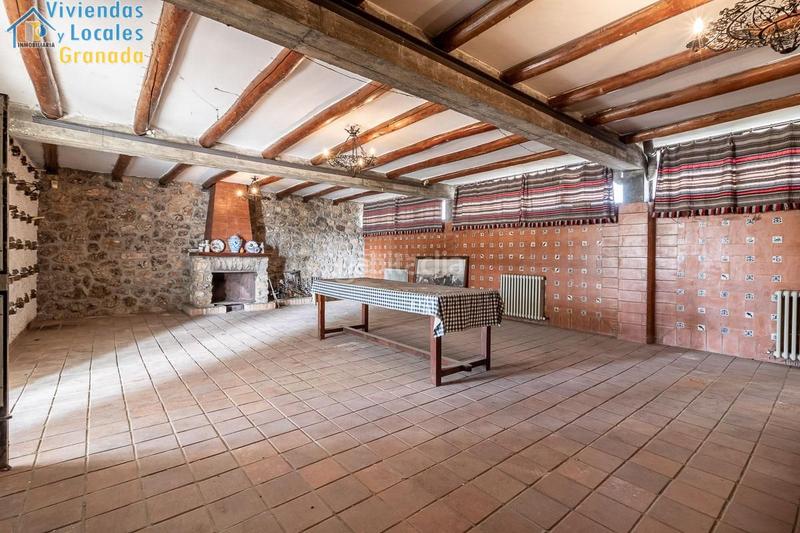 Foto 4d4c2fbc-cd7c-4d32-95a1-da254ba00bef. Masía casa con terreno y nave en Santa Fe