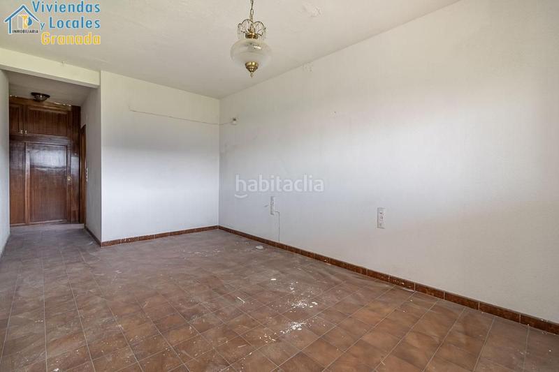 Foto cf8906fd-94b0-42ad-b9eb-e6fa4a6ab8d1. Masía casa con terreno y nave en Santa Fe