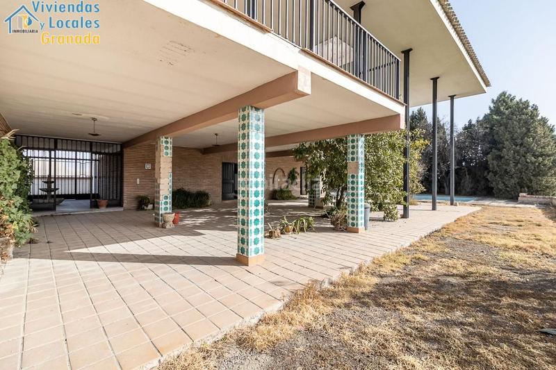 Foto f1f22ac8-f446-454f-83f6-79469b4e244f. Masía casa con terreno y nave en Santa Fe