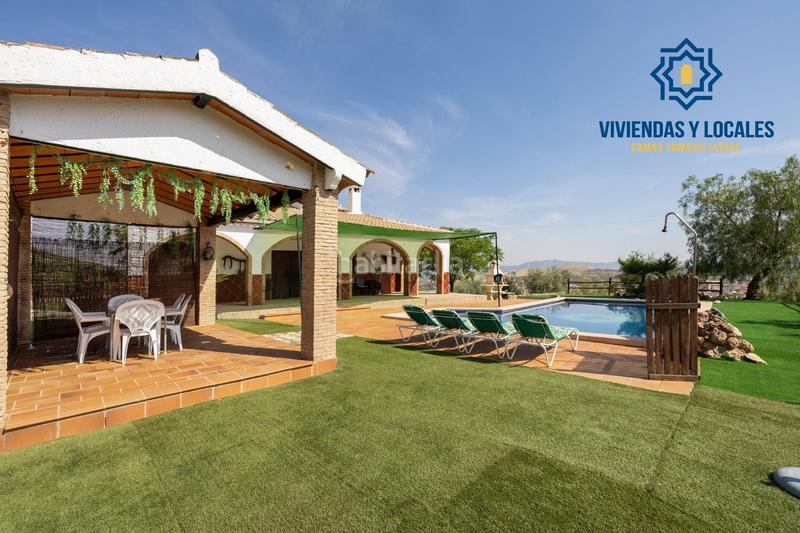 Foto 66ca8f26-a011-41c6-abc8-f76b6959dc43. Chalet estupendo chalet con apartamento y piscina en Salar