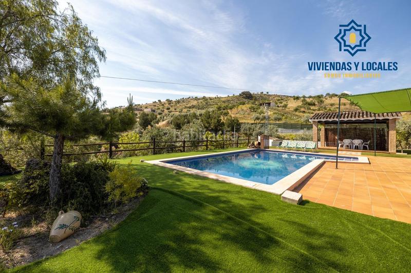 Foto e6e86305-8b07-4a03-a331-e5d1bbb52f3b. Chalet estupendo chalet con apartamento y piscina en Salar