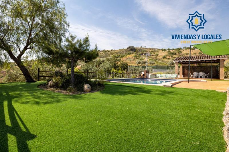 Foto fbf1caaf-a9cd-4eff-a809-cdee467869c8. Chalet estupendo chalet con apartamento y piscina en Salar