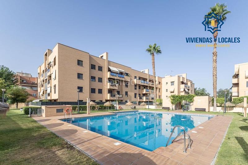 Foto c021b4e2-627f-47af-a367-8664996f4233. Piso  de dos dormitorios junto a parque almunia con piscina comunitaria en Granada