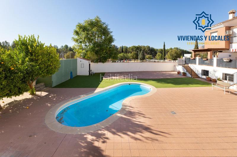 Foto 9e71e70e-1710-4e27-af93-332e6e91efc5. Casa adosada  con piscina y pádel en urb. llanos de silva en Atarfe