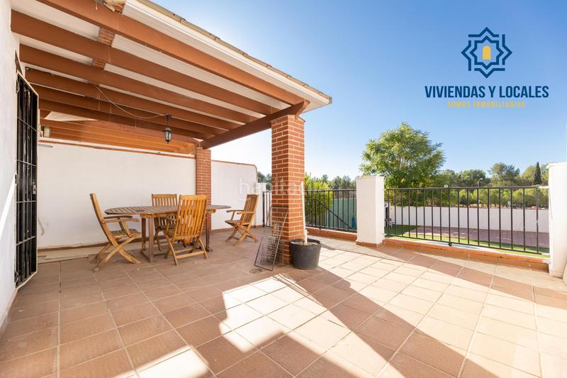 Foto df90f175-ad64-4b12-b8eb-12358812c6f3. Casa adosada  con piscina y pádel en urb. llanos de silva en Atarfe