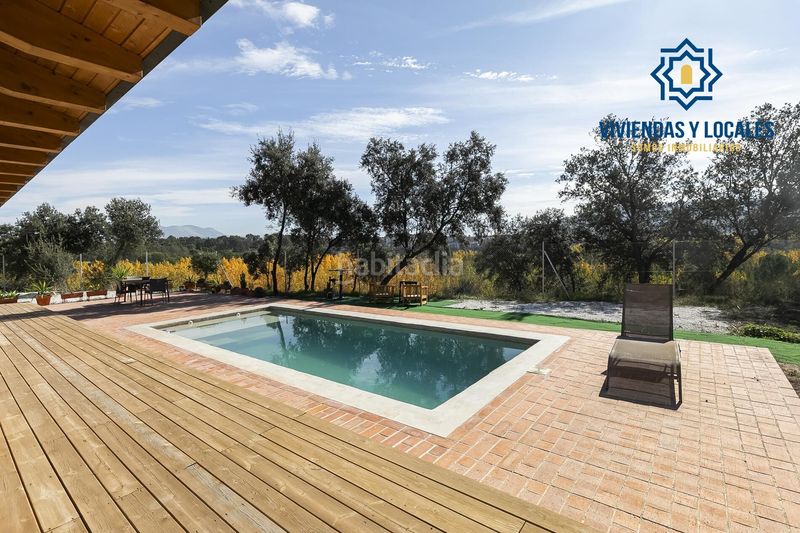 Foto 829d6bf7-688c-4dca-87e2-3ce697954f80. Casa adossada amb piscina a Atarfe