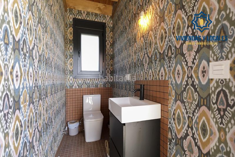 Foto ca636182-0fba-4fd5-9ed0-aeea266fce3a. Casa adossada amb piscina a Atarfe