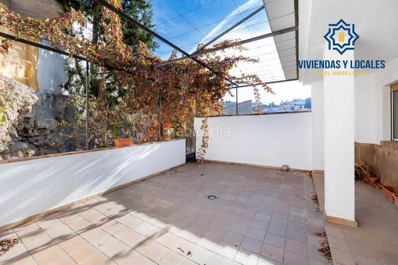 Foto 9c703b65-23d4-46db-ab9b-bd4b77310f94. Casa aparellada amb aparcament a Alfacar