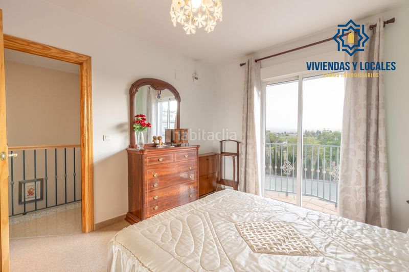 Foto e5db99e3-ef64-4a9e-8dbe-a3ffeef26c7f. Casa adossada amb aparcament a Maracena