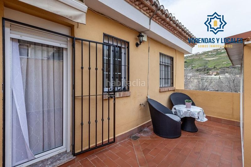 Foto 151b806b-3973-46e7-b113-5bde6cbb56db. Casa amb calefacció aparcament a Bola de Oro Granada