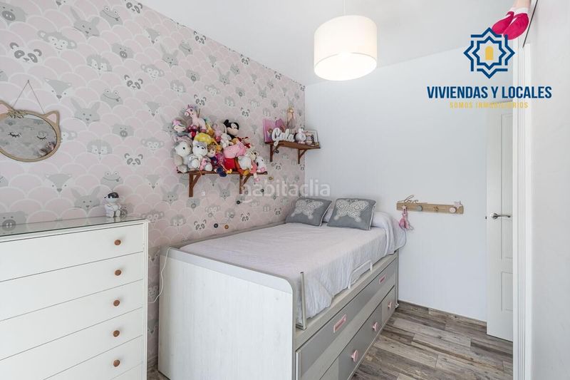 Foto ee7505c3-b1d2-4b61-a4f8-12b547b4a656. Casa aparellada amb aparcament a Atarfe