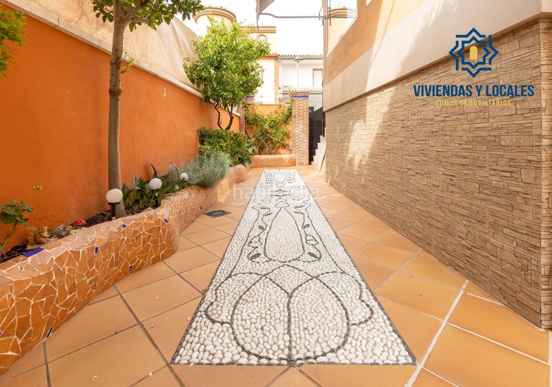 Foto 47b0f75c-5a53-4689-a034-881e1f9bdf3e. Casa aparellada amb aparcament a Jun