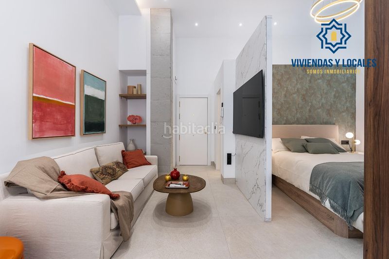 Foto fc1f5b6f-6a58-42ad-a35f-c3672d3d3e55. Planta baja precioso estudio de lujo en urbanizacion triunfo jardin en Granada