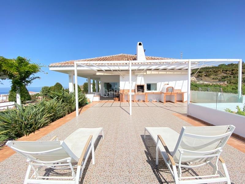 Foto e095265d-3bc7-4d17-8bbc-215c52f4fbb9. Chalet avec piscine dans Urbanización Santa Rosa Torrox