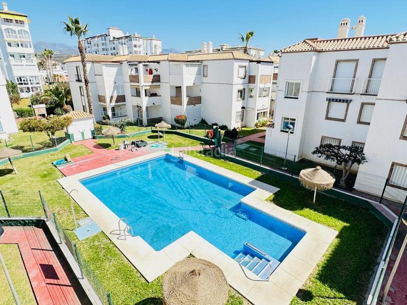 Foto c8644367-2fe5-451a-a606-b70ceecd9b32. Ático piso en primera línea de playa con vistas frontales al mar de 60 m2 en urbanización Laguna Beach costa. en Torrox