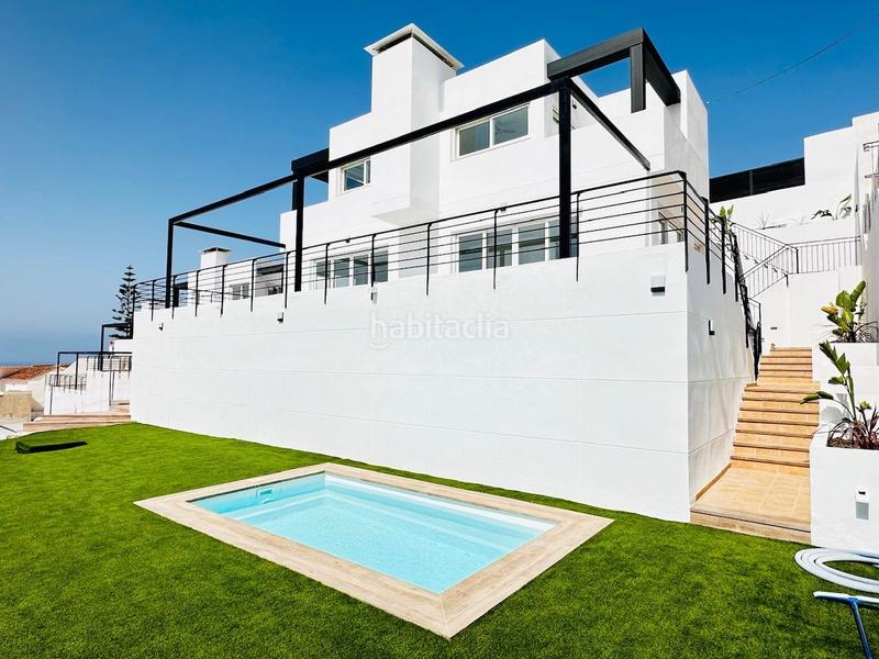 Foto 73eaf2ee-5367-4a8d-b8c2-c9b81e42bc67. Chalet villas de lujo de estilos modernos en la urbanización balcones dEl Peñoncillo costa. en Torrox