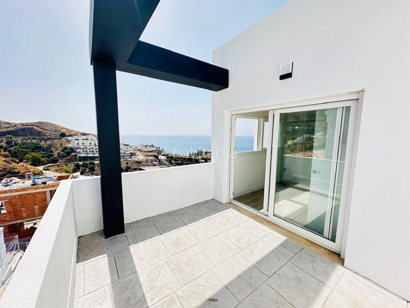 Foto c46c6294-d87c-40d0-8d74-79319357890c. Chalet villas de lujo de estilos modernos en la urbanización balcones dEl Peñoncillo costa. en Torrox