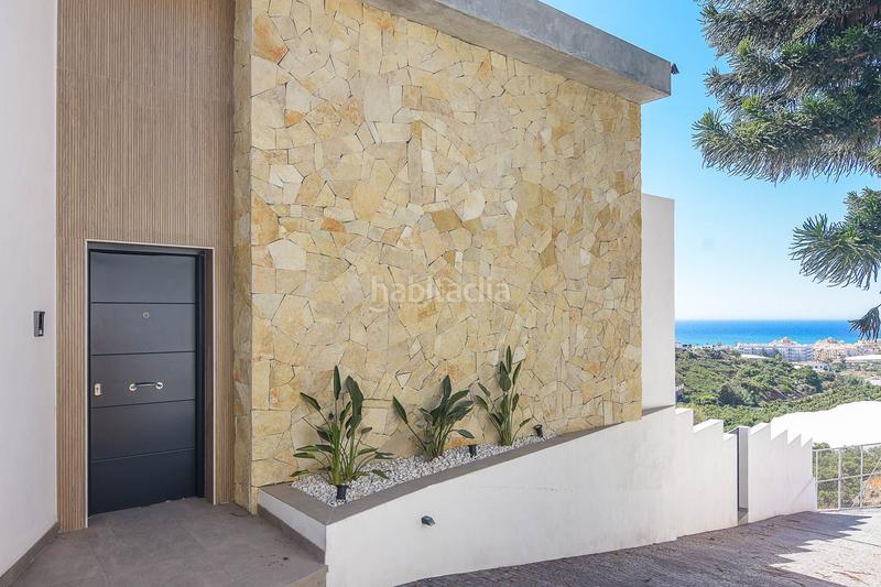 Foto dcca2c62-5a5a-4cef-8be1-9b5bd789e376. Chalet villa de lujo de estilo moderno costa. en Torrox