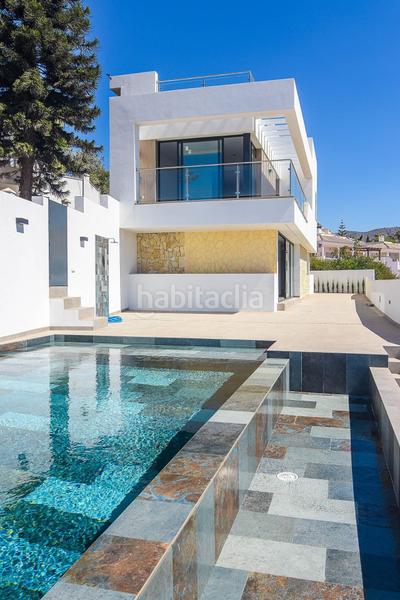 Foto fd0f16e9-7f69-42d0-ae3d-4571178ad47b. Chalet villa de lujo de estilo moderno costa. en Torrox
