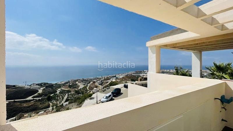 Foto 4b708c2b-c297-4699-98a7-34978deda0dd. Casa adosada chalet adosado costa con vistas panorámicas al mar en la urbanización balcones dEl Peñoncillo. en Torrox