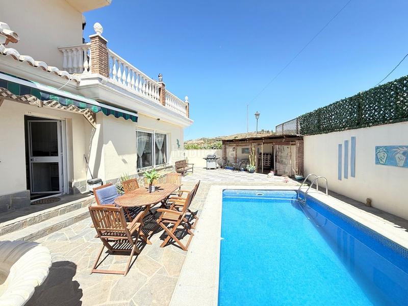Foto 43c27bf5-9d0d-49b3-8ba2-02e66699e7c4. Casa amb piscina a Urbanización Santa Rosa Torrox