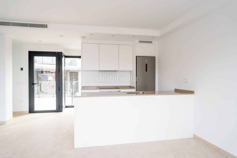 Foto ae8c2878-0a61-4c4e-ae28-b8abd0c56667. Casa adosada chalets de lujo de estilo moderno costa. en Torrox