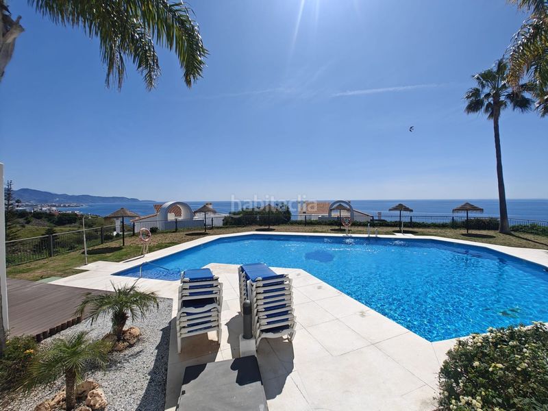 Foto fe80550b-154c-4840-a8e3-16dd5576272c. Flat with heating pool in El Peñoncillo Torrox