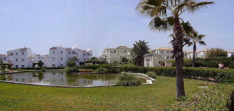 Foto d657e738-450d-4907-96e7-1de7cca23fff. Piso  en primera línea de playa con vistas frontales al mar en urbanización Laguna Beach costa. en Torrox