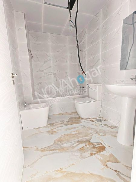 Foto 4272fc91-c978-40da-b0da-8634c0d1cdd6. Casa adossada amb aparcament a Campanillas Málaga