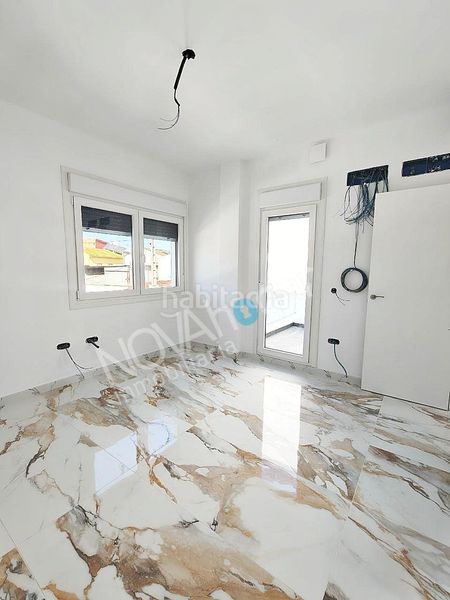 Foto addfc5ce-b895-4d9f-9950-cd8dd7375f1a. Casa adossada amb aparcament a Campanillas Málaga