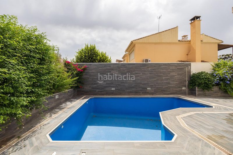 Foto b15f9025-72b2-4a7e-af98-47613bda832a. Xalet amb calefacció aparcament piscina a Barrio de la Vega Monachil