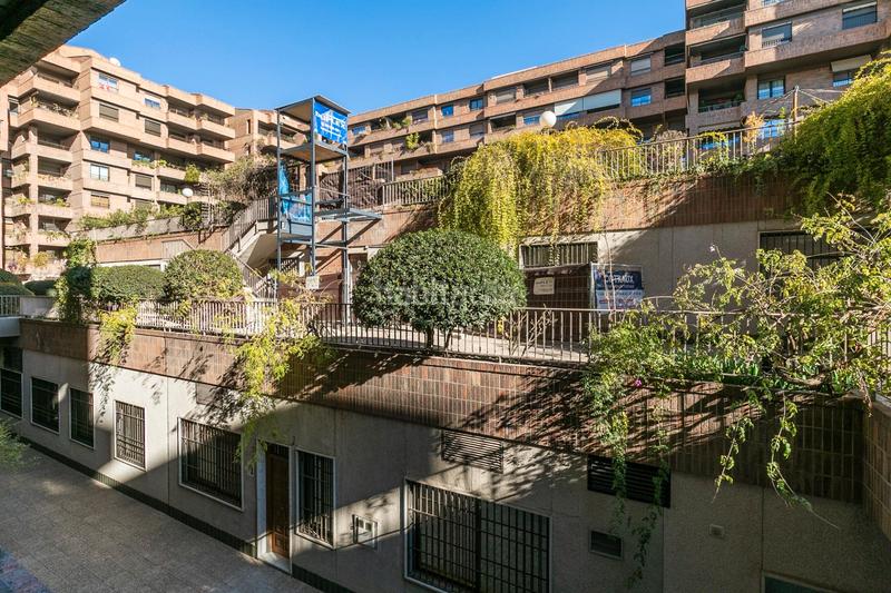 Foto 6eace1ad-915d-4a5c-9b64-69867e9d12be. Piso ¡vive en el corazón con todo el confort y lujo que mereces! te presentamos esta espectacular propiedad situada en una en Granada