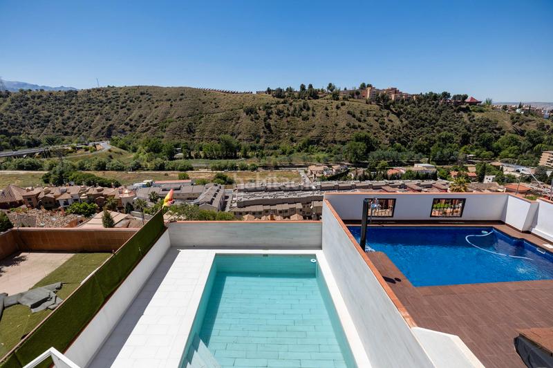 Foto a176f7e9-9f72-41fa-893a-a12b86960c13. Reihenhaus mit kamin heizung parking pool in Crta. De la Sierra Granada