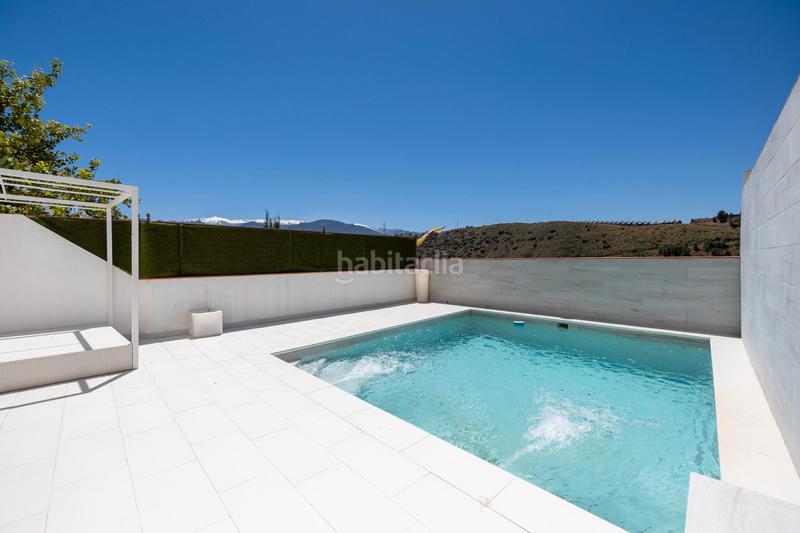 Foto c1e1f635-04c9-4401-9674-1d9a8db766ee. Reihenhaus mit kamin heizung parking pool in Crta. De la Sierra Granada